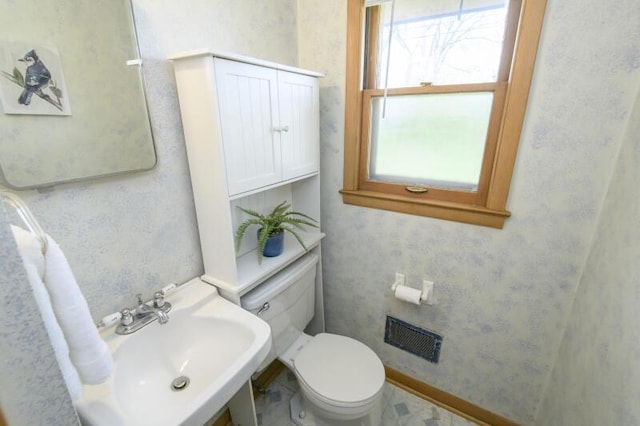 2334 W Custer Ave, Glendale, WI 53209 - bathroom featuring a sink and toilet