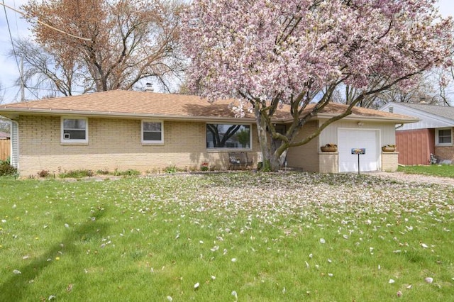 2334 W Custer Ave, Glendale, WI 53209 - ranch-style house featuring a garage, brick siding, and a front lawn