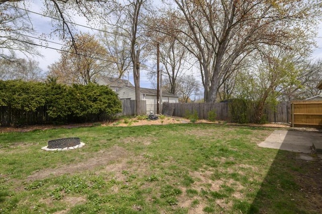 2334 W Custer Ave, Glendale, WI 53209 - view of yard featuring a fire pit and a patio