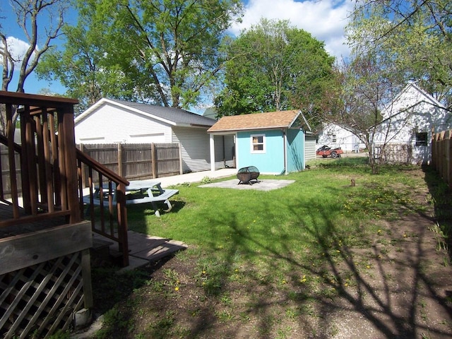 929 Park Ave, Beloit, WI 53511 - view of yard featuring an outdoor fire pit and an outbuilding