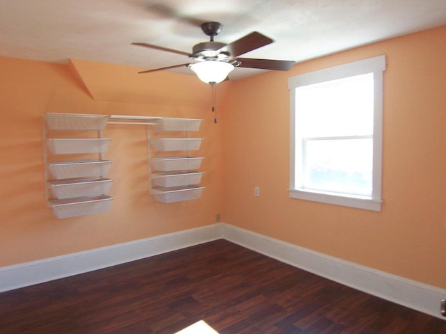 929 Park Ave, Beloit, WI 53511 - unfurnished room featuring dark wood finished floors, ceiling fan, and baseboards