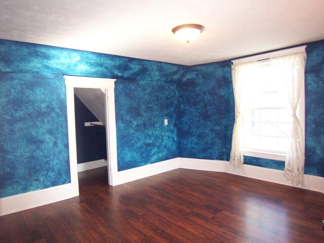 929 Park Ave, Beloit, WI 53511 - spare room featuring wood finished floors and baseboards