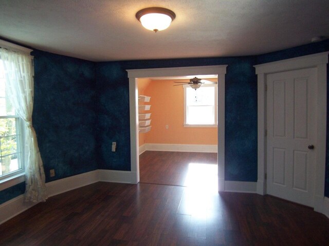 929 Park Ave, Beloit, WI 53511 - spare room with wood finished floors, baseboards, and ceiling fan