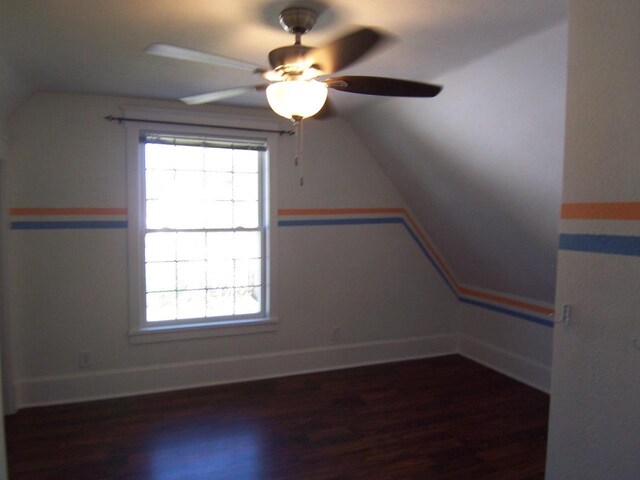 929 Park Ave, Beloit, WI 53511 - additional living space featuring wood finished floors, a ceiling fan, vaulted ceiling, and baseboards