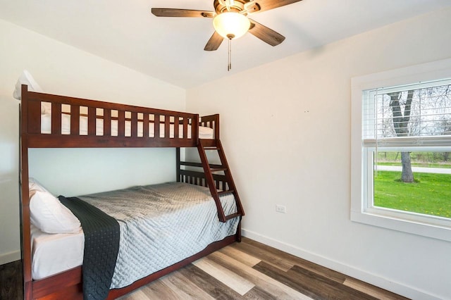 2965 S Stevenson Pier Rd, Sturgeon Bay, WI 54204 - bedroom with wood finished floors, baseboards, and a ceiling fan