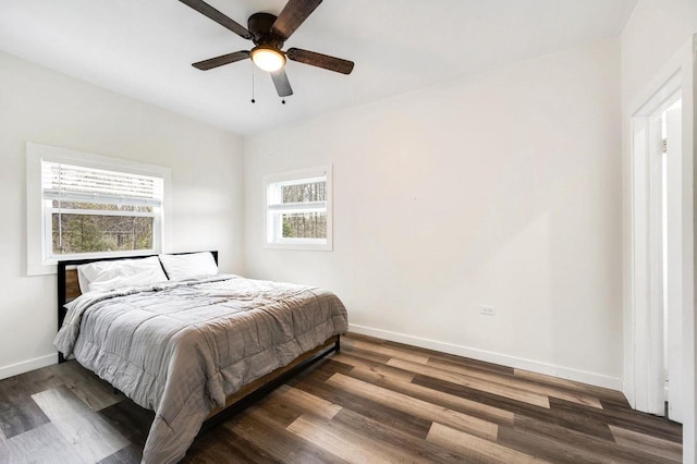 2965 S Stevenson Pier Rd, Sturgeon Bay, WI 54204 - bedroom featuring wood finished floors, baseboards, and ceiling fan