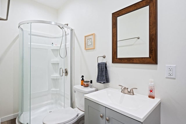2965 S Stevenson Pier Rd, Sturgeon Bay, WI 54204 - bathroom featuring a stall shower, vanity, and toilet