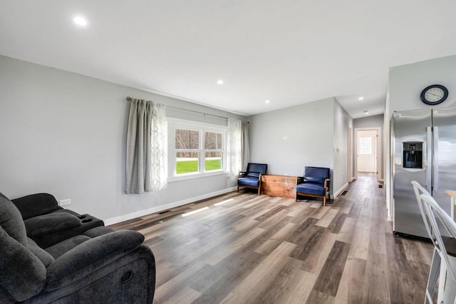 2965 S Stevenson Pier Rd, Sturgeon Bay, WI 54204 - living area featuring baseboards, wood finished floors, and recessed lighting