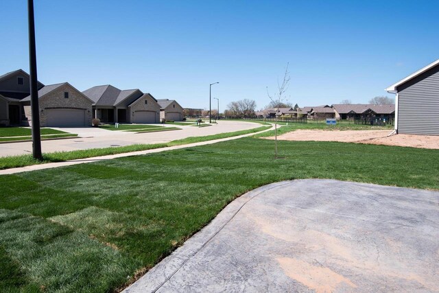 2239 E Honeygold Ct, Appleton, WI 54913 - view of grassy yard featuring a residential view