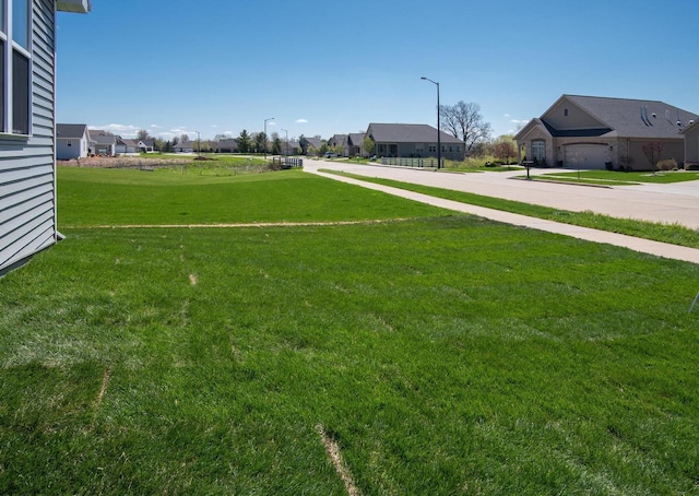 2239 E Honeygold Ct, Appleton, WI 54913 - view of green lawn featuring a residential view