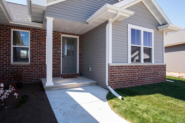 2239 E Honeygold Ct, Appleton, WI 54913 - doorway to property with brick siding