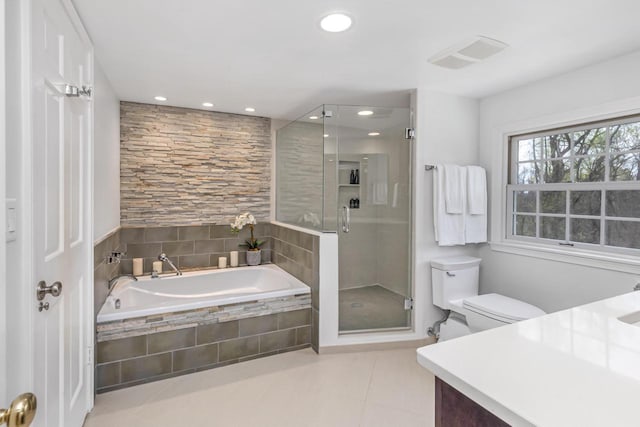 2305 W County Line Rd, River Hills, WI 53217 - bathroom with a shower stall, tile patterned floors, recessed lighting, a bath, and toilet