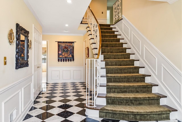 2305 W County Line Rd, River Hills, WI 53217 - stairs with a decorative wall, crown molding, recessed lighting, and a wainscoted wall