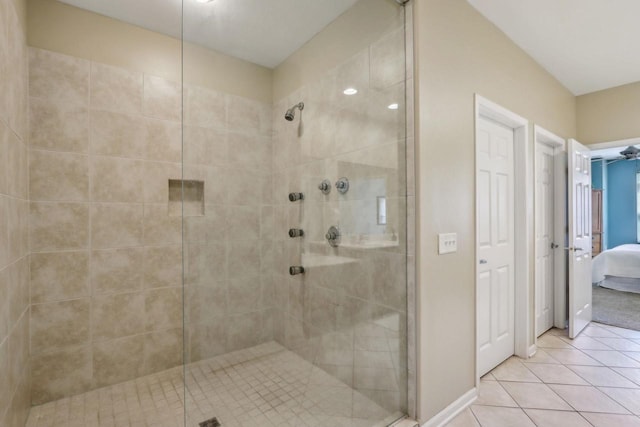 670 E Lake Ave Unit 202, Wisconsin Dells, WI 53940 - full bathroom featuring a stall shower, tile patterned flooring, and ensuite bath