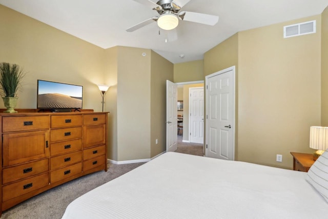 670 E Lake Ave Unit 202, Wisconsin Dells, WI 53940 - bedroom with light colored carpet, baseboards, and a ceiling fan