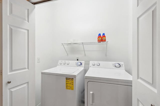 670 E Lake Ave Unit 202, Wisconsin Dells, WI 53940 - washroom with separate washer and dryer
