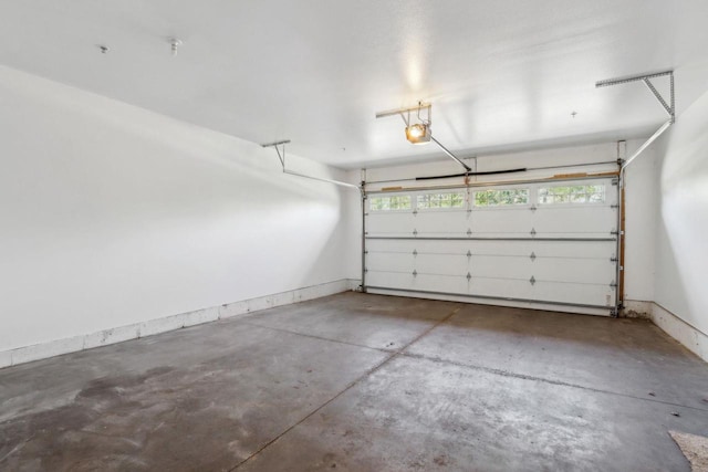 670 E Lake Ave Unit 202, Wisconsin Dells, WI 53940 - garage with a garage door opener