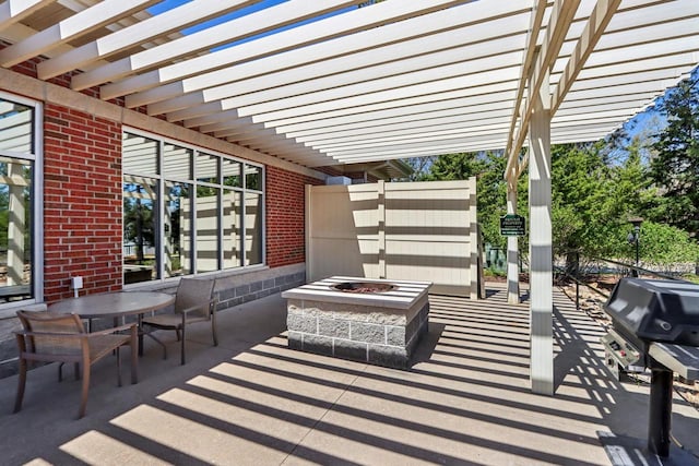 670 E Lake Ave Unit 202, Wisconsin Dells, WI 53940 - view of patio featuring a fire pit, a grill, a pergola, and outdoor dining area