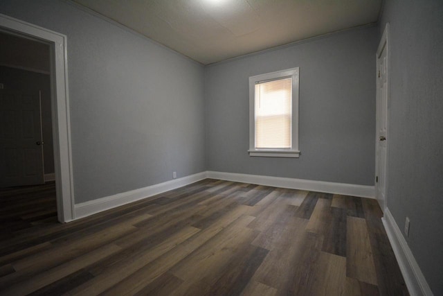 2625 N 50th St, Milwaukee, WI 53210 - unfurnished room featuring dark wood-style flooring and baseboards