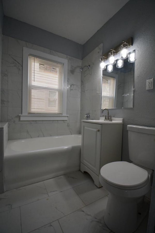 2625 N 50th St, Milwaukee, WI 53210 - full bath with marble look tile flooring, toilet, and vanity
