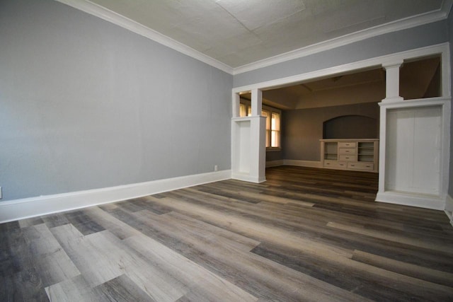 2625 N 50th St, Milwaukee, WI 53210 - unfurnished living room with crown molding, dark wood-style flooring, and baseboards