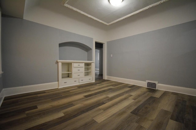 2625 N 50th St, Milwaukee, WI 53210 - empty room featuring baseboards and dark wood-type flooring