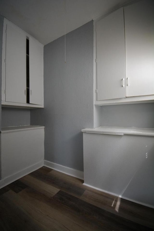 2625 N 50th St, Milwaukee, WI 53210 - interior space featuring dark wood-style floors and baseboards