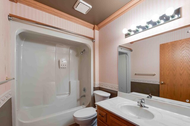 8200 43rd Ave, Kenosha, WI 53142 - bathroom featuring wallpapered walls, crown molding, toilet,  shower combination, and vanity