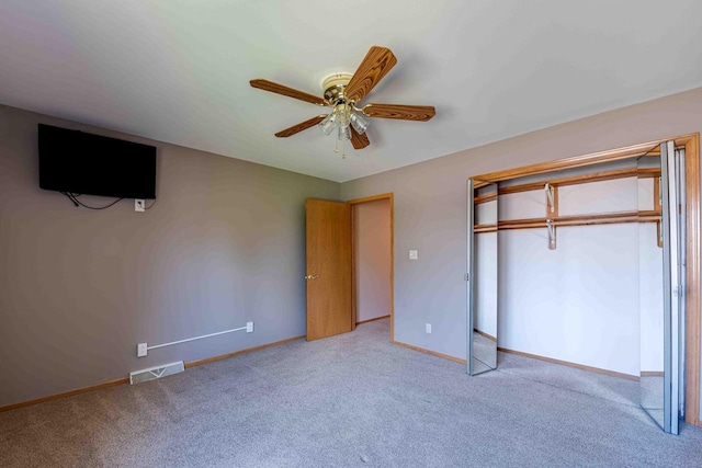 8200 43rd Ave, Kenosha, WI 53142 - unfurnished bedroom featuring carpet, baseboards, a closet, and ceiling fan