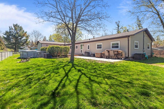 3500 W Justin St, Appleton, WI 54914 - back of house with a patio and central AC unit