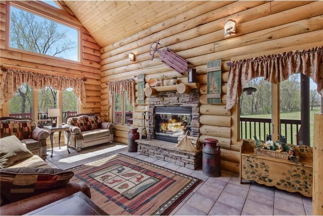 N5502 90th St, Elmwood, WI 54740 - tiled living room with high vaulted ceiling, rustic walls, a stone fireplace, and wood ceiling