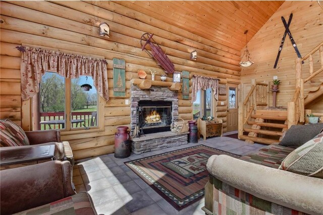 N5502 90th St, Elmwood, WI 54740 - living area with wood ceiling, a fireplace, plenty of natural light, high vaulted ceiling, and rustic walls