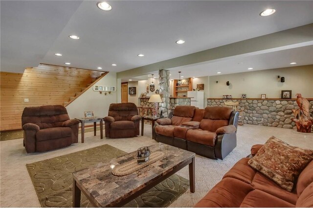 N5502 90th St, Elmwood, WI 54740 - carpeted living area with recessed lighting, stairway, and wooden walls