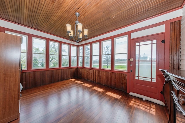 12220 W Highland Rd, Mequon, WI 53097 - unfurnished sunroom featuring hardwood / wood-style floors, a chandelier, wood walls, and wooden ceiling