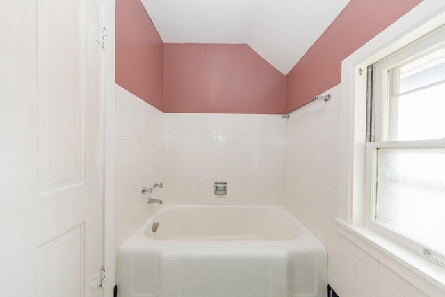 12220 W Highland Rd, Mequon, WI 53097 - bathroom with a tub and lofted ceiling
