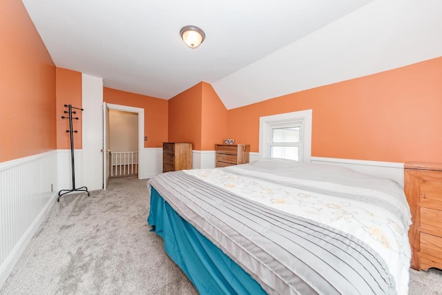12220 W Highland Rd, Mequon, WI 53097 - carpeted bedroom with wainscoting and vaulted ceiling