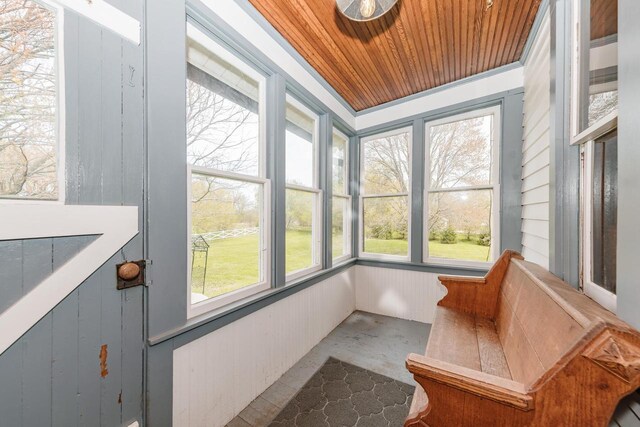 12220 W Highland Rd, Mequon, WI 53097 - unfurnished sunroom featuring wood ceiling