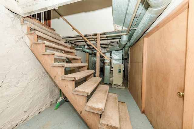12220 W Highland Rd, Mequon, WI 53097 - unfinished below grade area featuring stairway and heating unit