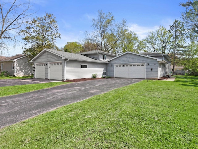 503 W Walworth St Unit 505, Elkhorn, WI 53121 - view of front of house with a front lawn, a garage, and driveway