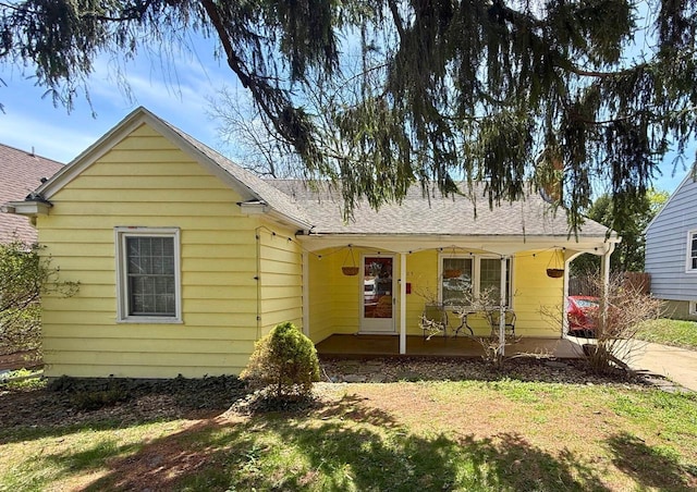 4105 Meyer Ave, Madison, WI 53711 - view of front of home with covered porch and a shingled roof