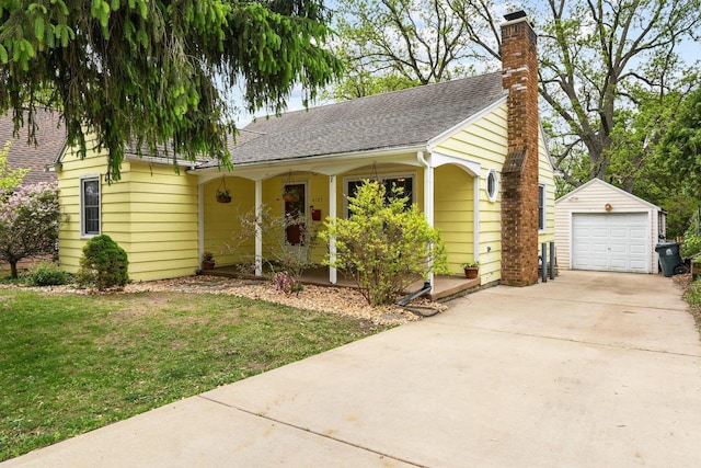 4105 Meyer Ave, Madison, WI 53711 - ranch-style house with an outbuilding, covered porch, a chimney, a front lawn, and concrete driveway