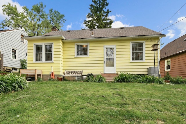 4105 Meyer Ave, Madison, WI 53711 - back of property with a lawn and a chimney