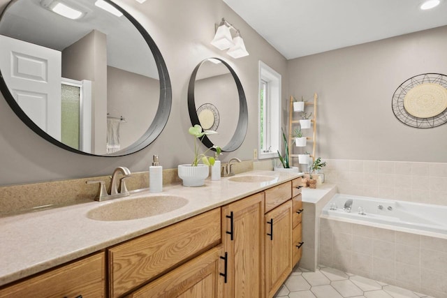 956 Kingston Cir, Sun Prairie, WI 53590 - bathroom featuring tile patterned flooring, double vanity, a garden tub, and a shower stall
