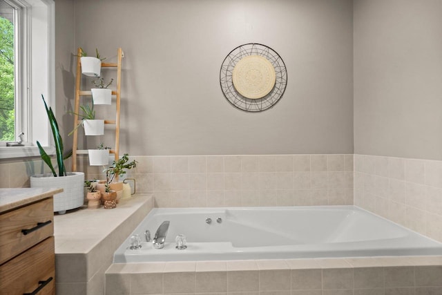 956 Kingston Cir, Sun Prairie, WI 53590 - full bath featuring vanity, a garden tub, and healthy amount of natural light