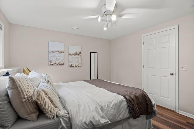 956 Kingston Cir, Sun Prairie, WI 53590 - bedroom with wood finished floors, a ceiling fan, and baseboards