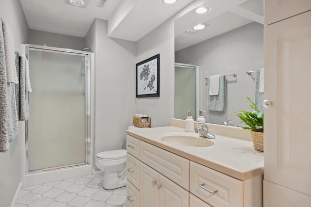 956 Kingston Cir, Sun Prairie, WI 53590 - full bath with vanity, a stall shower, toilet, and tile patterned flooring