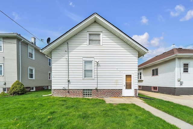 1235 Grove Ave, Racine, WI 53405 - back of property with a lawn