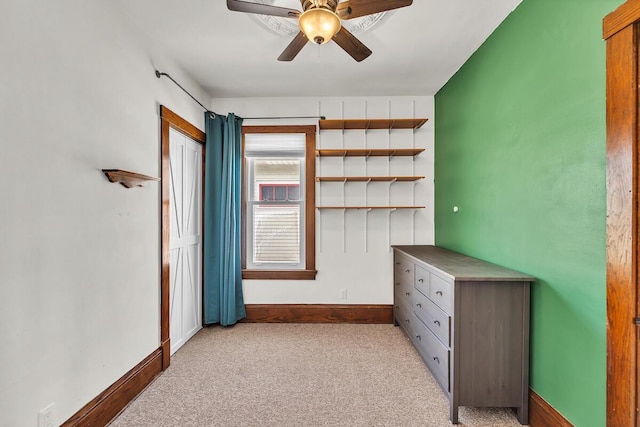 1235 Grove Ave, Racine, WI 53405 - unfurnished bedroom featuring carpet flooring, baseboards, and ceiling fan
