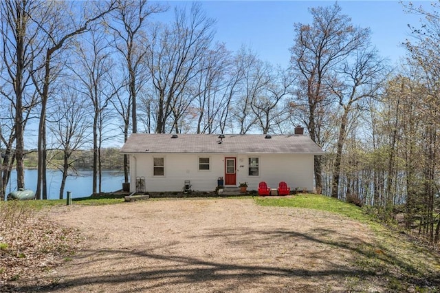 1141 134th Ave, Amery, WI 54001 - rear view of house featuring a water view and a chimney