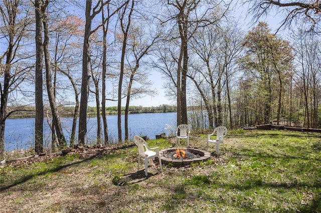 1141 134th Ave, Amery, WI 54001 - view of yard with a fire pit and a water view